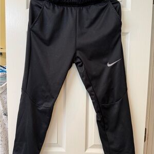 Nike Kids Black Athletic Joggers with Silver Swoosh